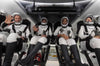 Four astronauts on their way back to Earth aboard a SpaceX capsule