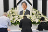 Japan between mourning and protest during the national funeral of Shinzo Abe