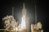 An Ariane 5 rocket lifts off with two telecommunications satellites