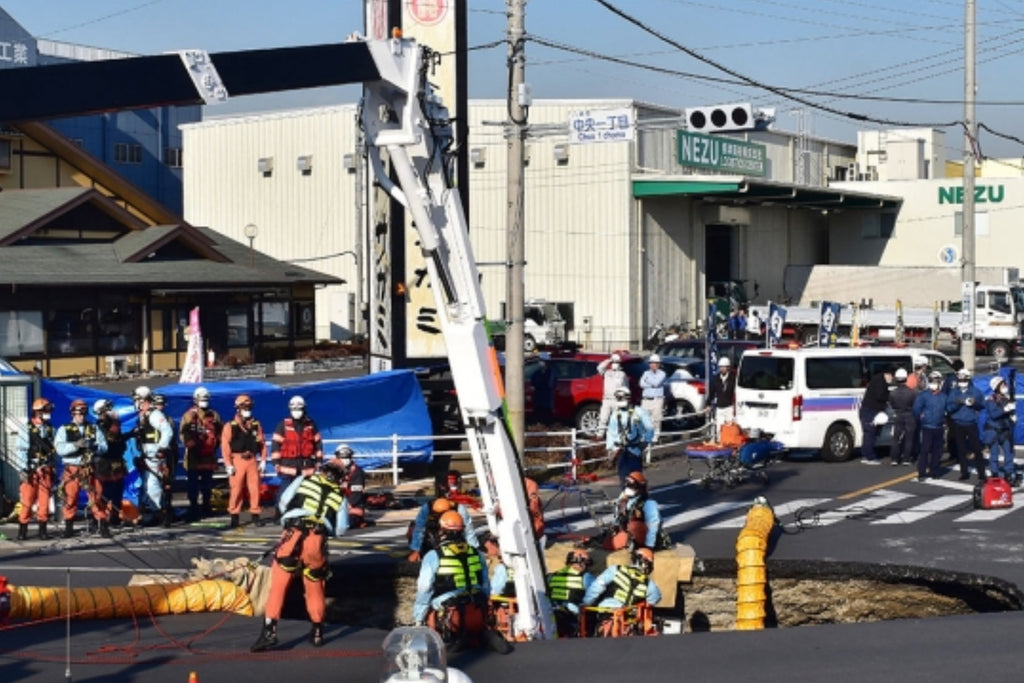 A truck and its driver have been missing “for 24 hours” in a giant hole in the street in Tokyo.