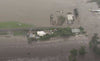 Floods in Australia: a house is swept away by the current